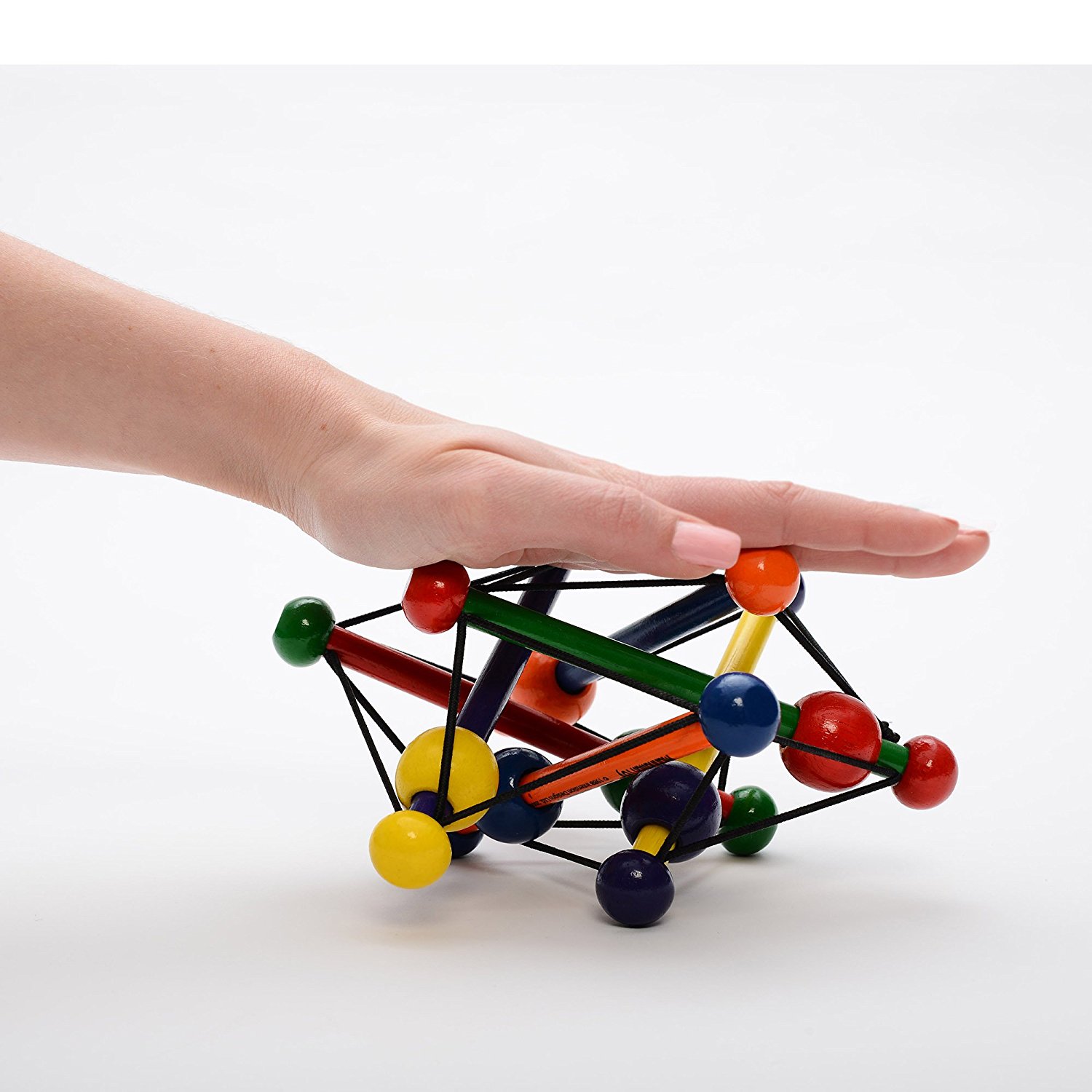 Skwish a magic wooden rattle Skwish appeals to baby s visual and tactile curiosity